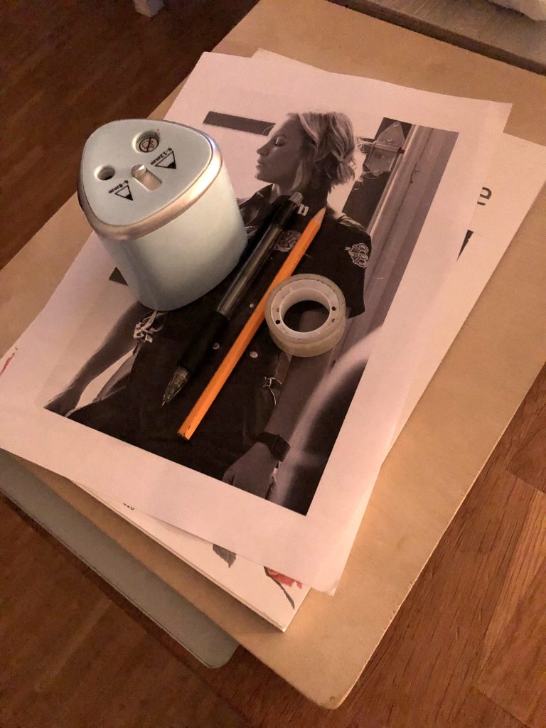 Artist selecting premium materials for personalized acrylic painting.